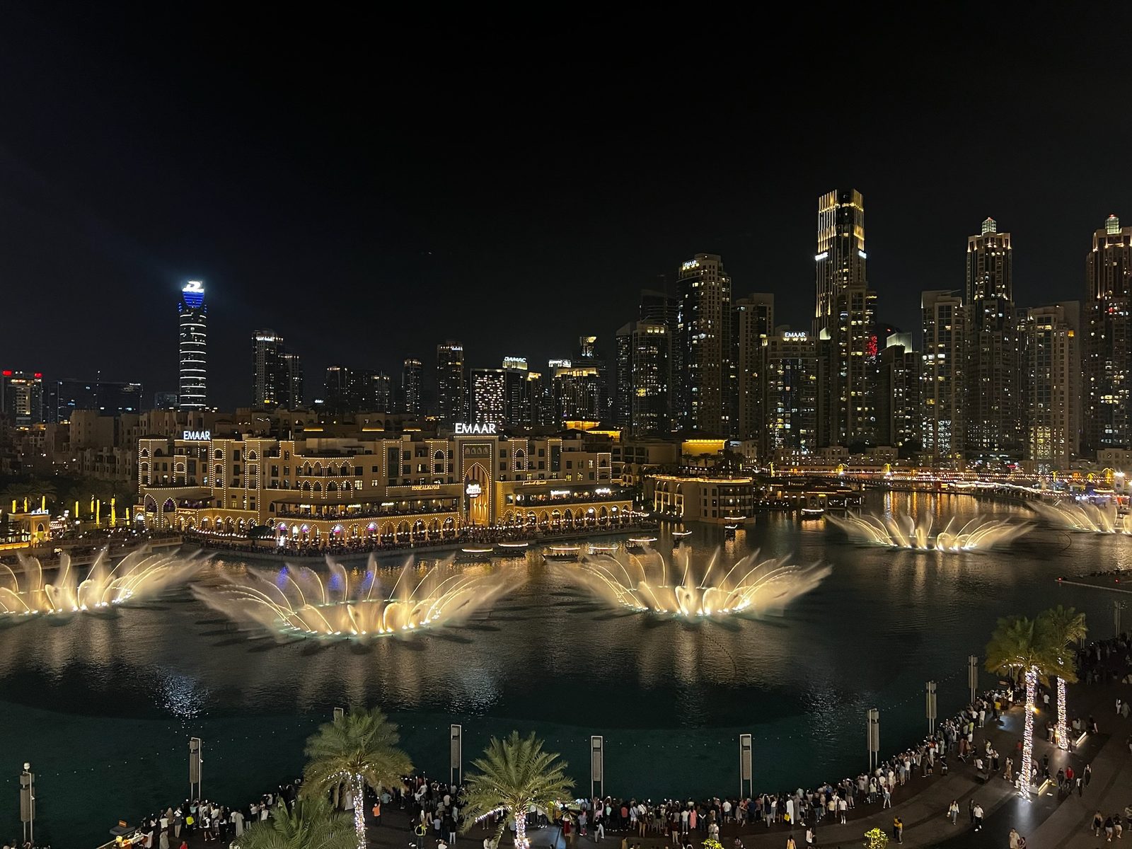 The Dubai Fountain show at night with the Downtown skyline